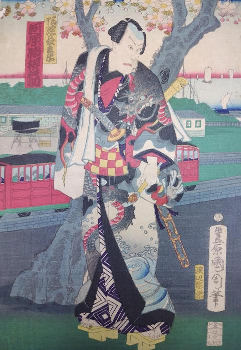 写真:華やかな衣装を着た歌舞伎役者が描かれた浮世絵