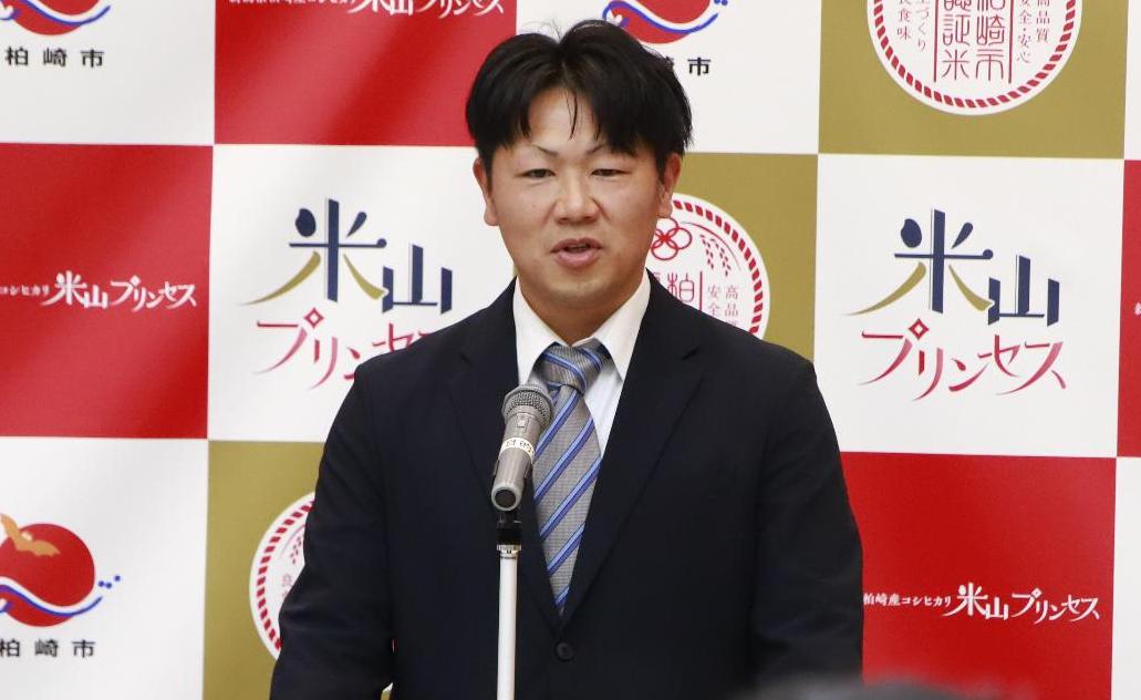 写真：認証者の冨田優さん