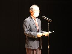 写真：坂井委員長が主催者を代表して開会のあいさつをしています