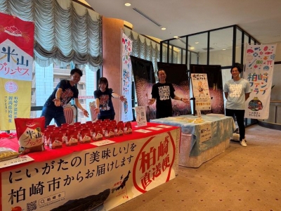 写真：出展ブースの様子。米山プリンセス新米がずらっと並べられています