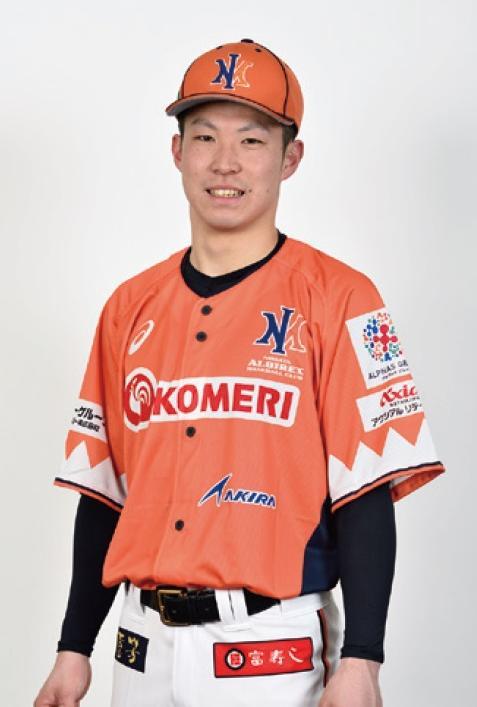 オレンジのユニフォームを着ている前川 恒選手の写真